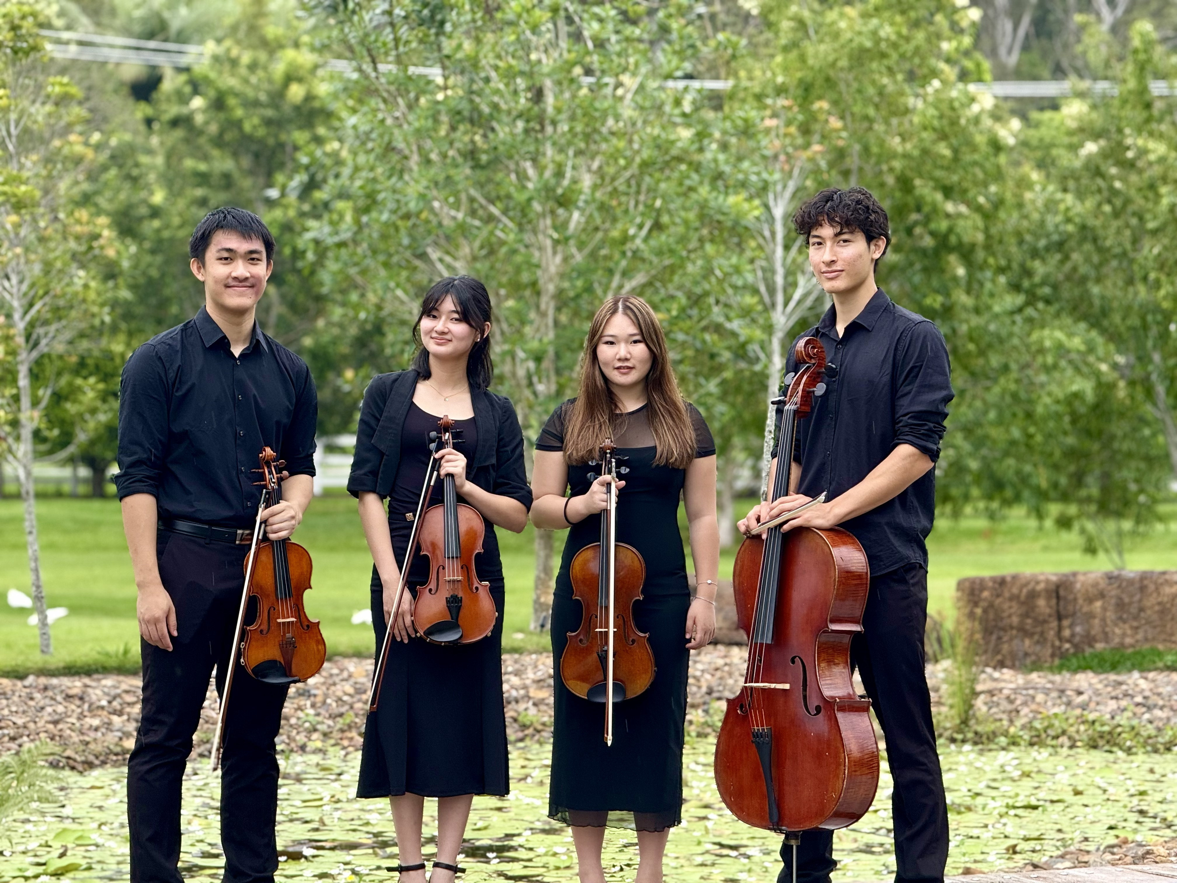 Quarto Music quartet outdoors